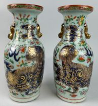 A PAIR OF CHINESE CELADON CANTON WARE VASES DECORATED WITH LIONS, BUTTERFLIES AND FLOWERS (2),