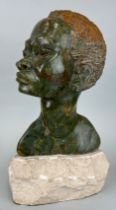 A FINE AFRICAN SOAPSTONE BUST OF A FIGURE MOUNTED ON A STONE STAND, 30cm H On stand 21cm H