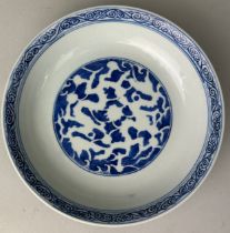 A CHINESE BLUE AND WHITE PLATE, Six character mark to verso. 18cm D