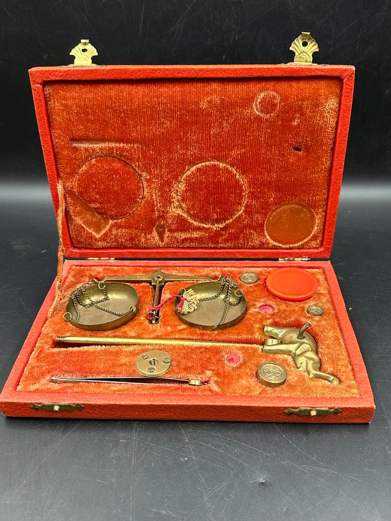 Boxed set of weigh scales with elephant figure