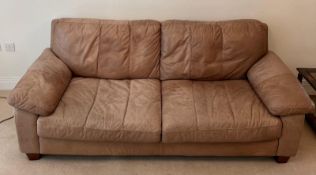 A three seater leather sofa (H78cm W208cm D92cm)