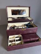 A leather Jewellery box containing a wide range of quality costume jewellery
