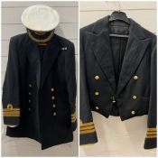 A Royal naval mess dress jacket and naval uniform jacket along with cap