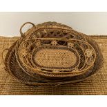 A collection of six wicker baskets