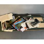 A vintage postcard album with a large quantity of post cards