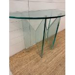 A contemporary glass demi lune hall table AF