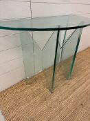 A contemporary glass demi lune hall table AF