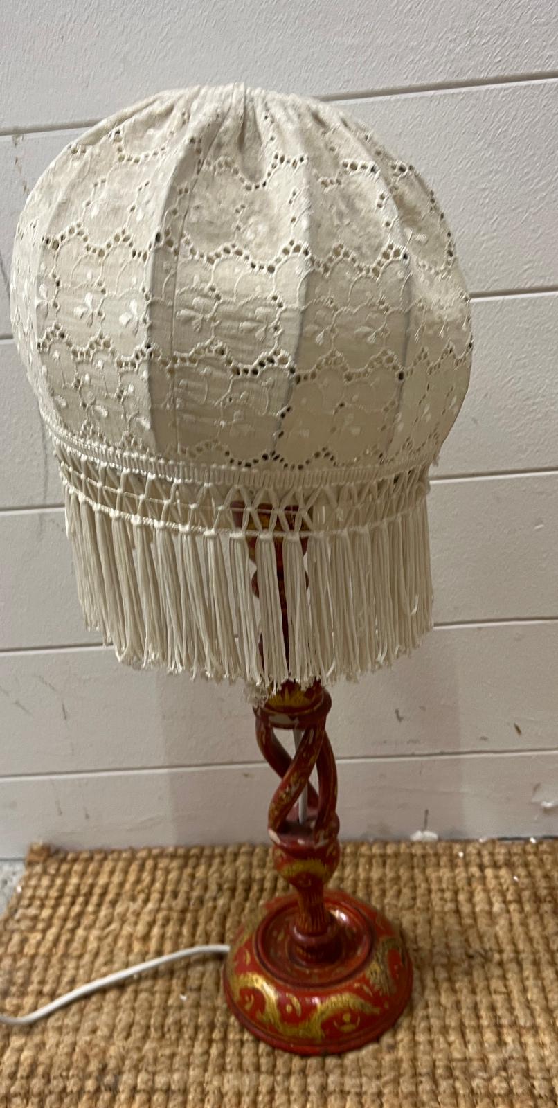 A paper Mache red table lamp