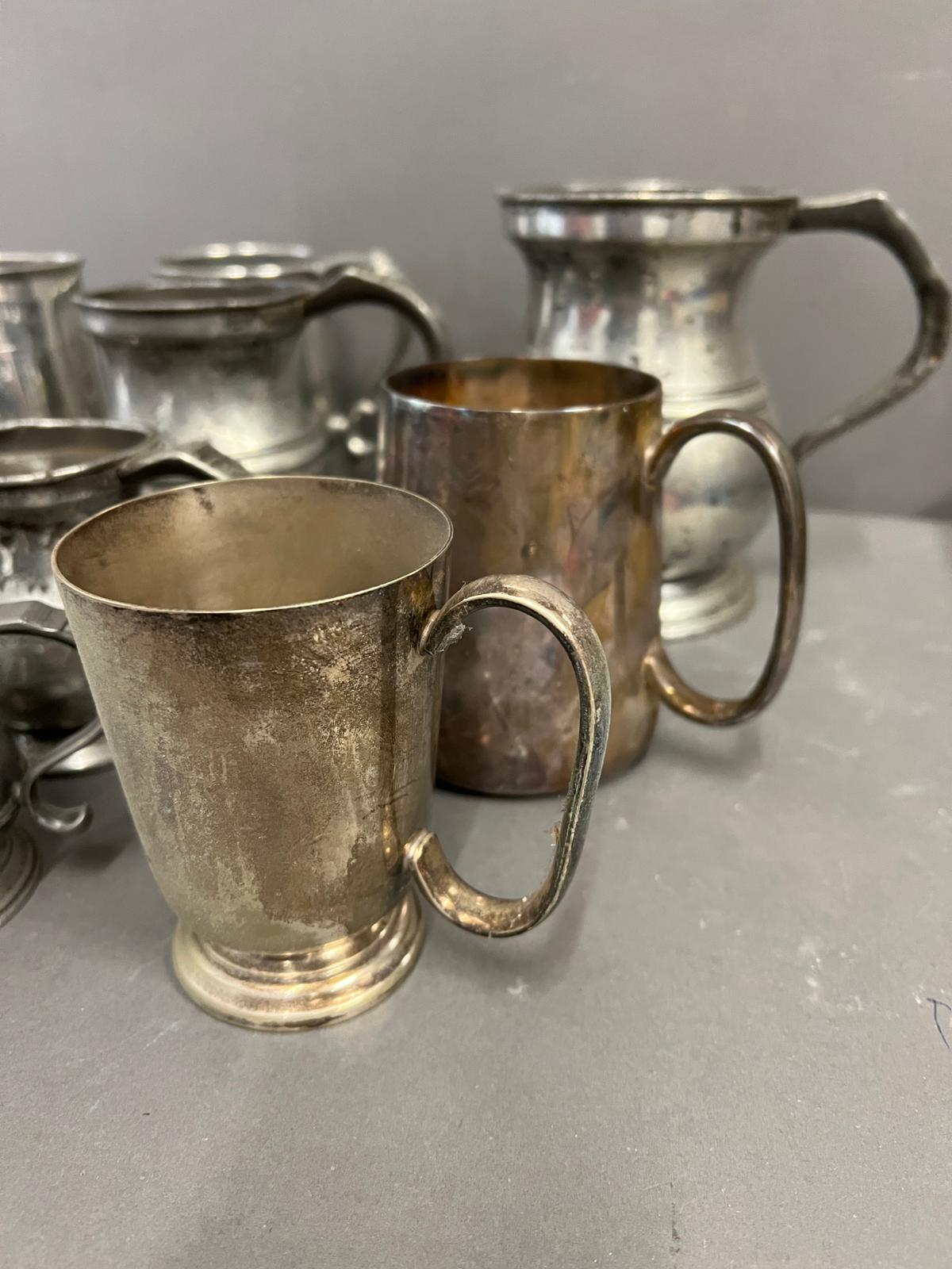 A selection of eleven tankards, various makers, styles some pewter, some silverplate and various - Image 4 of 7