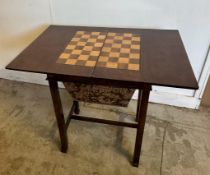 A burr walnut games table with swivel top, green baize and chess board (H77cm W58cm D42cm)
