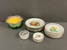 A selection of picture plates and a pot in the form of a flower