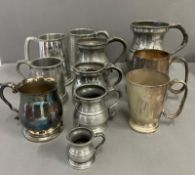 A selection of eleven tankards, various makers, styles some pewter, some silverplate and various