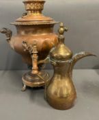 A copper samovar urn and Arabic early brass coffee pot