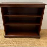 A reproduction mahogany open bookcase (95cm X 24cm)