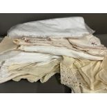 A collection of linen various sizes and ages