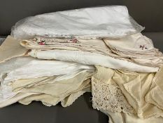 A collection of linen various sizes and ages