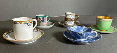 A selection of coffee cans and saucers, various makers and marks to include Royal Worcester