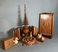 A selection of decorative treen to include book ends, ducks and a tray