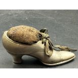 A Victorian shoe pin cushion