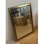A contemporary wooden gold painted two tone hall mirror (72cm x 103cm)