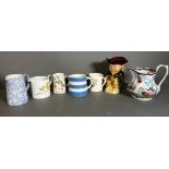 A selection of ceramic jugs various makers to include T.G.Green, Cornish ware and a Toby jug