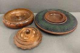 Three wooden serving dishes, one signed to base