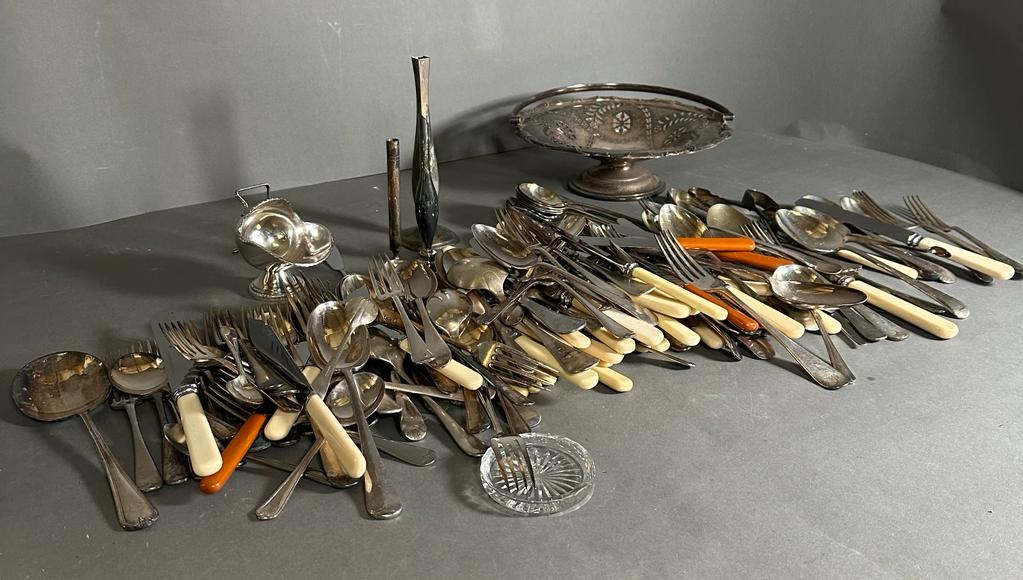 A volume of silverplated items along with flatware etc.