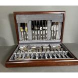 A six piece canteen of cutlery in a wooden box by Arthur Price