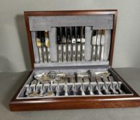 A six piece canteen of cutlery in a wooden box by Arthur Price