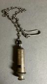 A vintage Acm city whistle on chain