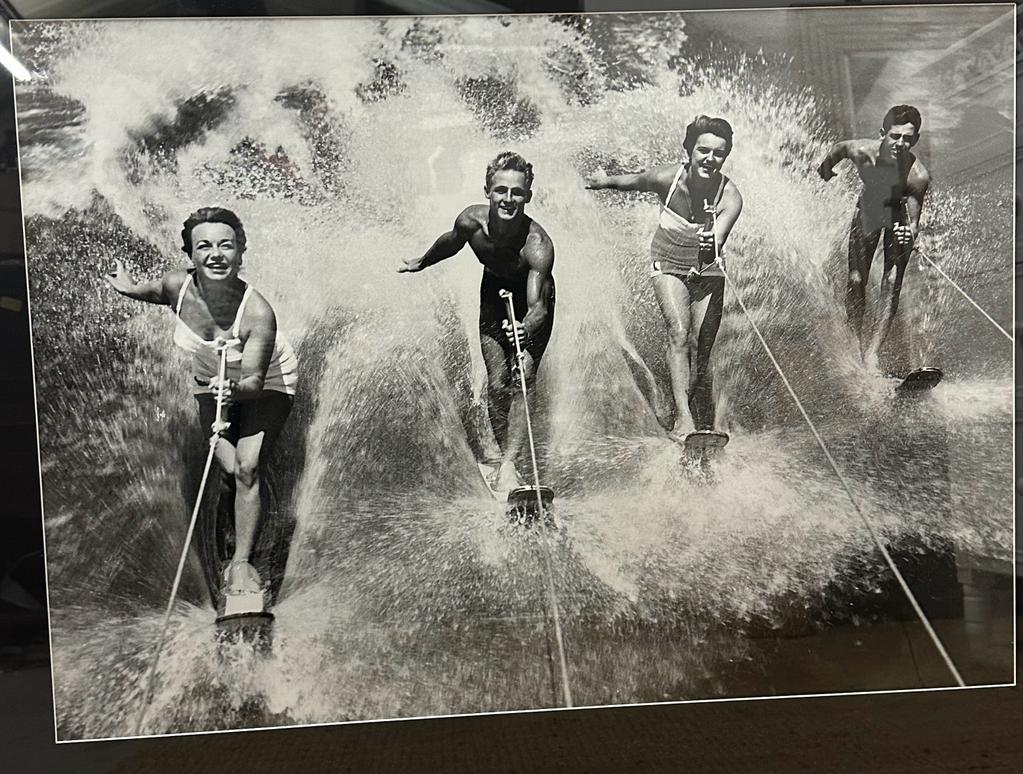 A framed black and white photograph of a 1950's water skiing party 69x49 - Image 4 of 5
