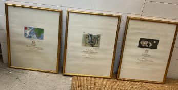 Three framed wine label artwork prints