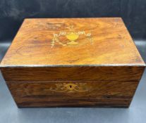 A vintage inlaid sewing box urn and scrolling central cartouche