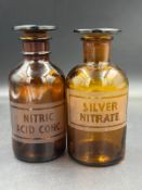 Two glass apothecary glass jars Silver Nitrate and Nitric Acid Conc