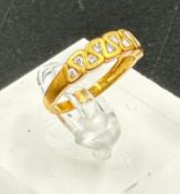 An 18ct gold diamond ring, size M, approximate weight 3.3g
