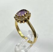 An 18ct amethyst and diamond ring, approximate total weight 3.2g