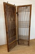 A Korean pine slatted screen 110cm x 178cm