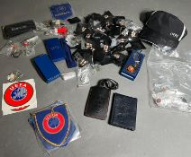 A selection of football memorabilia including pin badges, stickers, caps etc, formerly the