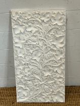 A plaster plaque with floral pattern 64cm x 33cm