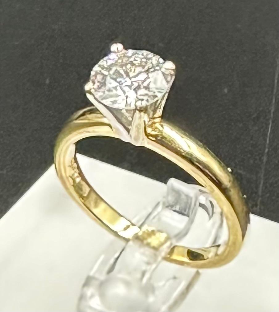 A Diamond set single stone ring, round brilliant cut diamond measuring 6.65mmx 6.64mm x 4.2mm depth, - Image 4 of 4
