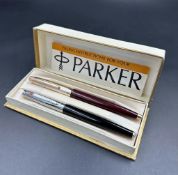 Two Vintage pens including a Parker rollerball