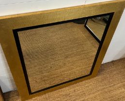 A large mirror with black/gold frame 107 x 130cm