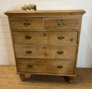 Two over three pine chest of drawers with brass handles (H114cm W98cm D50cm)