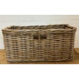 A wicker magazine rack or occasional basket (30cm x 60cm x 27cm)