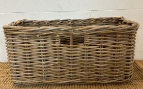 A wicker magazine rack or occasional basket (30cm x 60cm x 27cm)