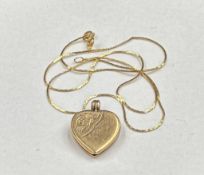 A 9ct gold locket and extra fine necklace, with an approximate total weight of 5.6g