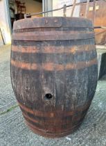 Two reclaimed timber metal banded whisky barrels (H127cm Dia67cm) ( H110cm Dia 75cm)