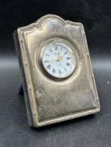A silver easel backed clock by R Carr, hallmarked for Sheffield. H 9cm