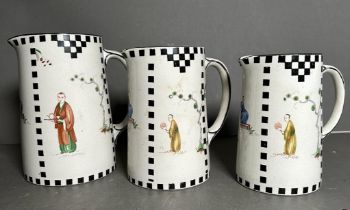 A selection of three Royal Staffordshire graduating jugs decorated in an oriental theme. Condition