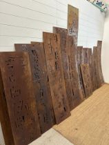 Seventeen reclaimed metal sheets pierced with musical notes, various sizes